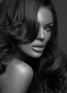 Lip Fillers-Ashland, OR-Illume Aesthetics A beautiful woman showing her plump lips from lip fillers at Illume Aesthetics in Ashland, OR.