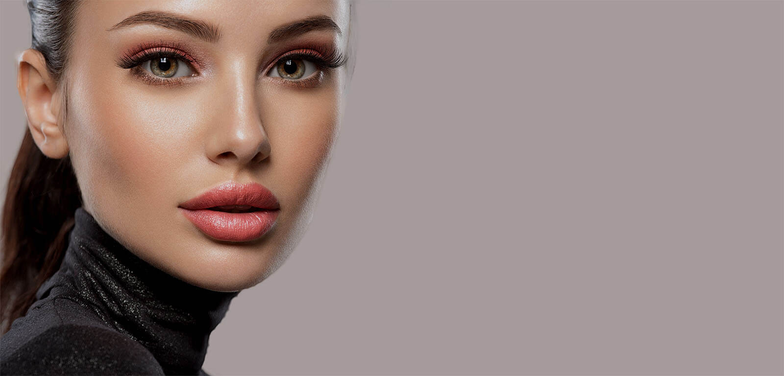 Portrait of beautiful young woman with bright pink makeup Beaut