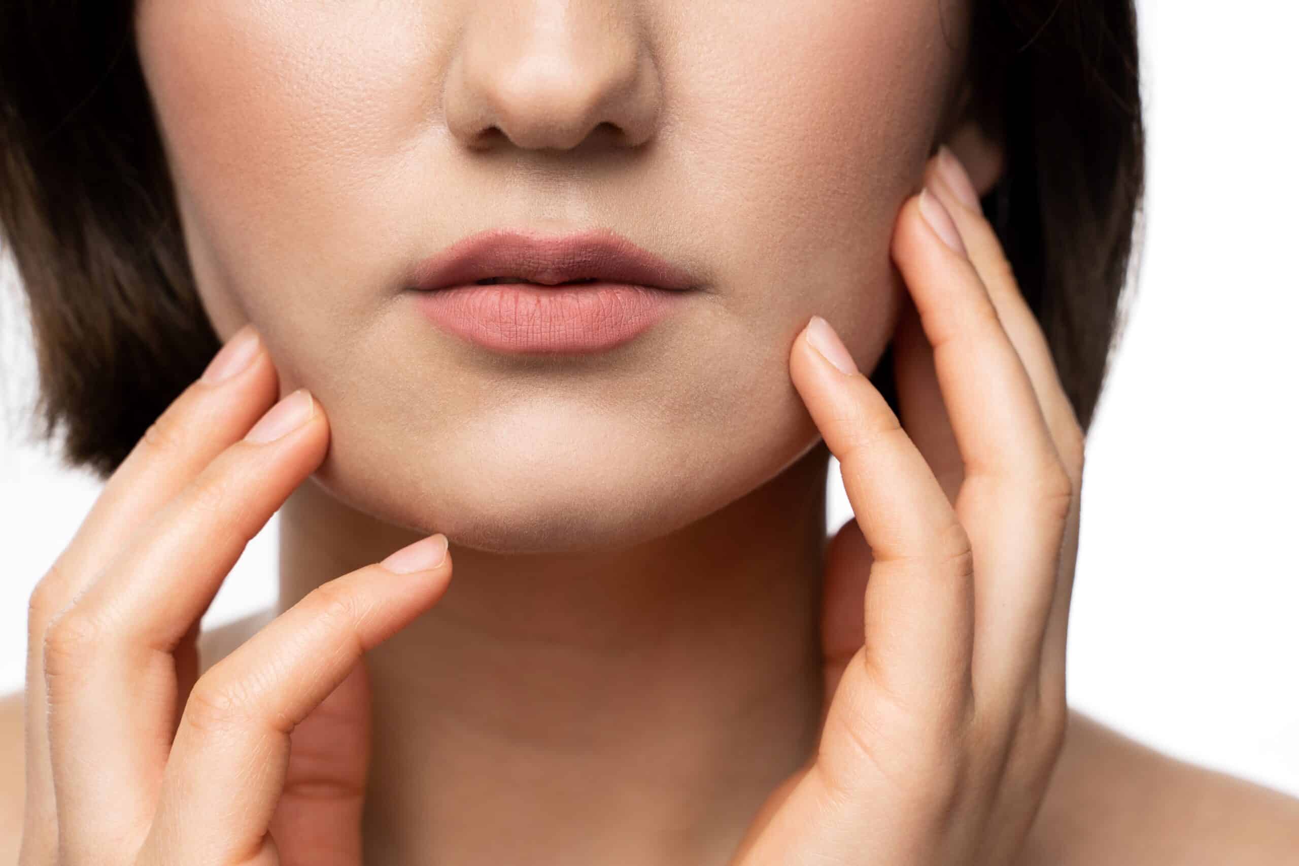 Woman's jawline and chin profile — Kybella double chin treatment at Illume Aesthetics